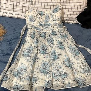 Speckless white and blue dress with bow tied on back